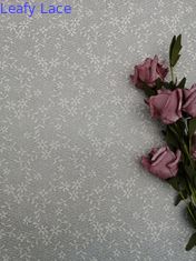 نسيج دانتيل صغير عاجي مزين بالزهور بنسبة 100٪